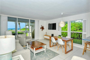 LaPlaya 101A Step out to the beach from your screened lanai Light and bright end unit